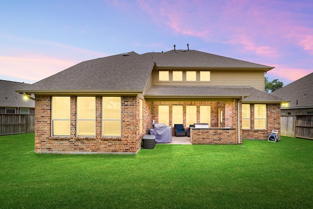 300 Bentside Pl, Clute, TX 77531 - back of house with a patio area, brick siding, and roof with shingles