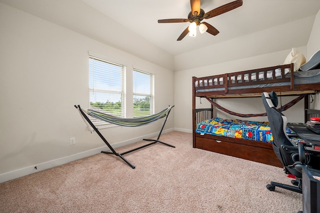 300 Bentside Pl, Clute, TX 77531 - carpeted bedroom with baseboards, lofted ceiling, and a ceiling fan