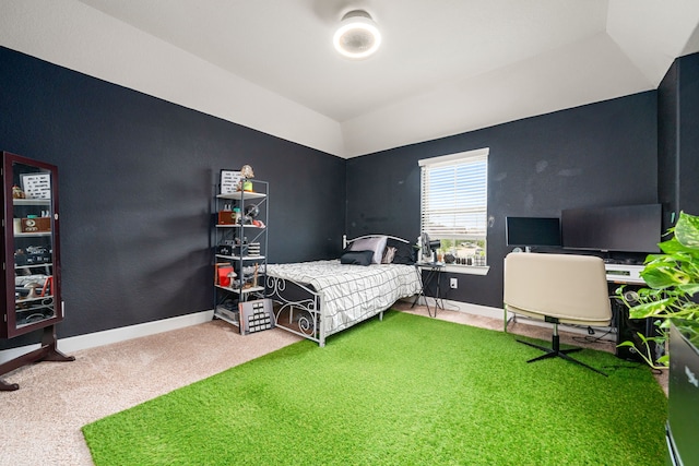 300 Bentside Pl, Clute, TX 77531 - carpeted bedroom with vaulted ceiling and baseboards