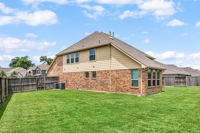 300 Bentside Pl, Clute, TX 77531 - rear view of house with brick siding, central AC, and roof with shingles