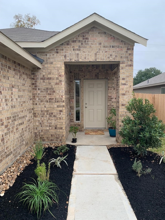 318 Riverwood Village Ln, Sealy, TX 77474 - view of exterior entry with brick siding