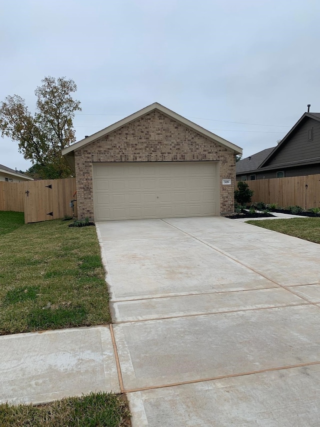 318 Riverwood Village Ln, Sealy, TX 77474 - view of front of property featuring brick siding and driveway