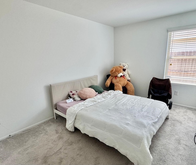 318 Riverwood Village Ln, Sealy, TX 77474 - carpeted bedroom with baseboards