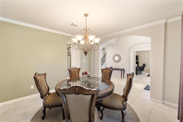 4610 Countrymeadows Dr, Spring, TX 77388 - dining area featuring arched walkways, a chandelier, light tile patterned floors, ornamental molding, and baseboards