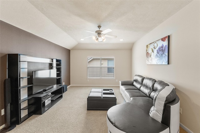 4610 Countrymeadows Dr, Spring, TX 77388 - living area with light colored carpet, ceiling fan, baseboards, a textured ceiling, and lofted ceiling