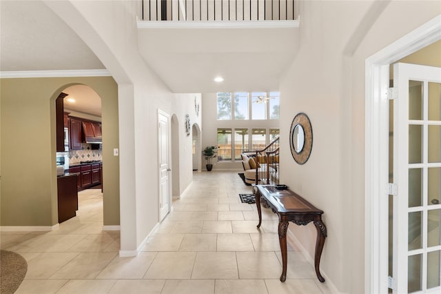 4610 Countrymeadows Dr, Spring, TX 77388 - entrance foyer featuring a high ceiling, light tile patterned floors, baseboards, crown molding, and recessed lighting