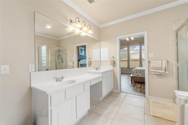 4610 Countrymeadows Dr, Spring, TX 77388 - ensuite bathroom with ornamental molding, double vanity, a stall shower, tile patterned floors, and baseboards