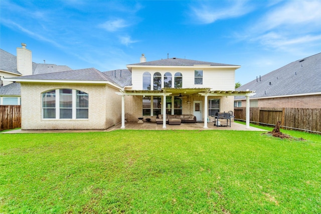 4610 Countrymeadows Dr, Spring, TX 77388 - back of property featuring a pergola, outdoor lounge area, a patio, ceiling fan, and a chimney
