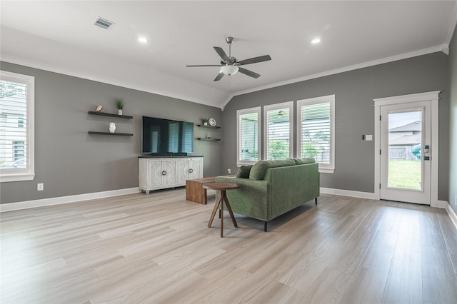 14424 Tunnel Tree Ct, Conroe, TX 77384 - living area featuring crown molding, a ceiling fan, light wood-style flooring, baseboards, and lofted ceiling