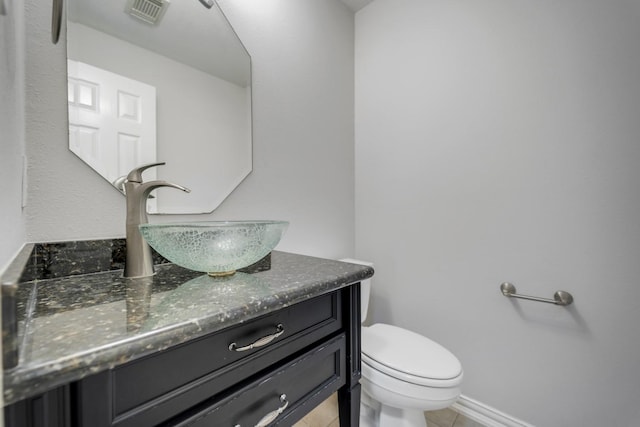 3935 Waverly Bnd, Katy, TX 77450 - bathroom featuring vanity, toilet, tile patterned floors, and baseboards