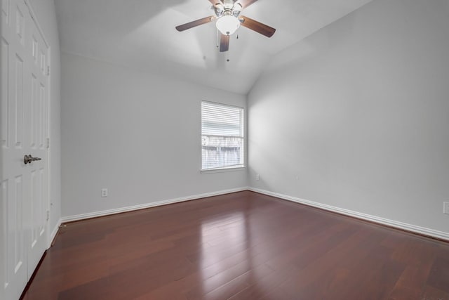 3935 Waverly Bnd, Katy, TX 77450 - spare room with lofted ceiling, baseboards, a ceiling fan, and wood finished floors
