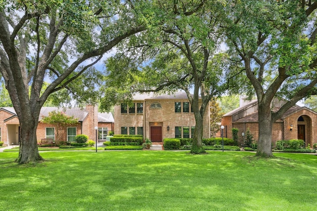 2628 Glen Haven Blvd, Houston, TX 77025 - view of front facade with a front yard and brick siding