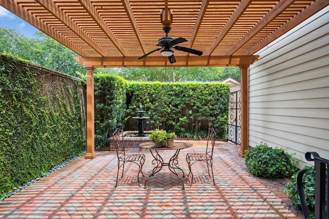2628 Glen Haven Blvd, Houston, TX 77025 - fenced backyard featuring a patio, a ceiling fan, and a pergola