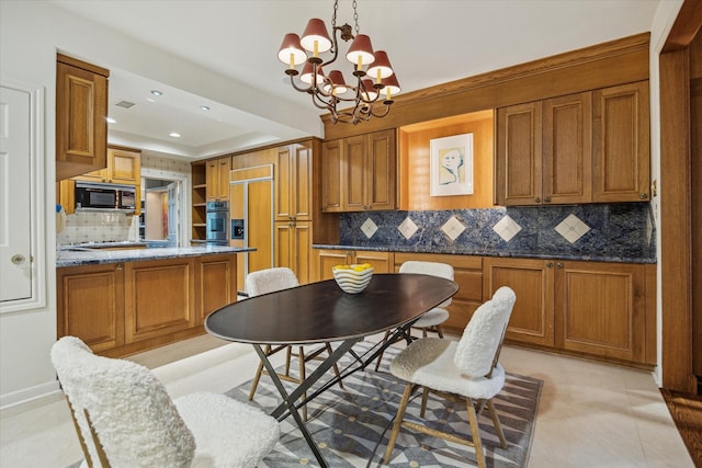 2628 Glen Haven Blvd, Houston, TX 77025 - dining space with a chandelier and recessed lighting