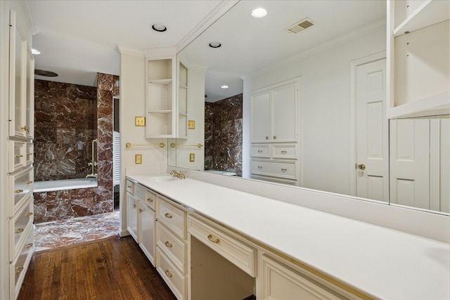2628 Glen Haven Blvd, Houston, TX 77025 - bathroom with wood finished floors, vanity, recessed lighting, and crown molding