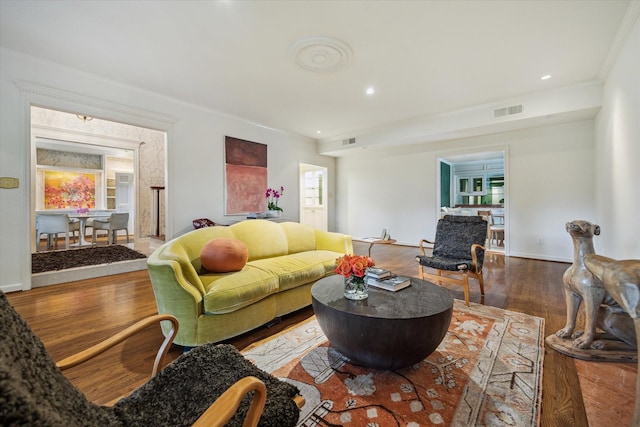2628 Glen Haven Blvd, Houston, TX 77025 - living room featuring wood finished floors, crown molding, and recessed lighting