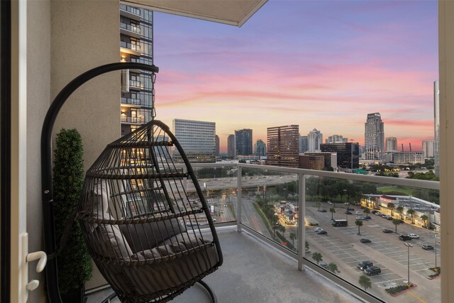4521 San Felipe St Unit 1201, Houston, TX 77027 - balcony at dusk with a view of skyline