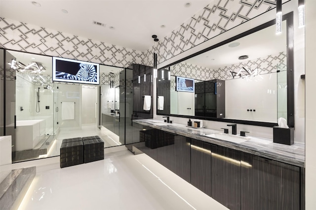 4521 San Felipe St Unit 1201, Houston, TX 77027 - bathroom featuring double vanity, a shower stall, tile patterned flooring, and a tub to relax in