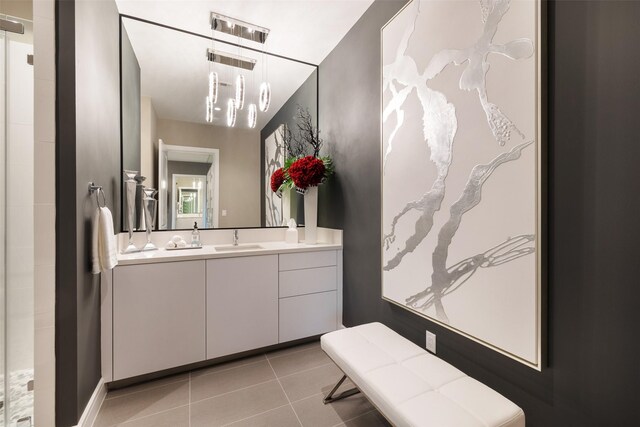 4521 San Felipe St Unit 1201, Houston, TX 77027 - bathroom featuring vanity and tile patterned floors