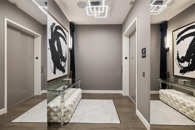 4521 San Felipe St Unit 1201, Houston, TX 77027 - entrance foyer featuring elevator, wood finished floors, and baseboards