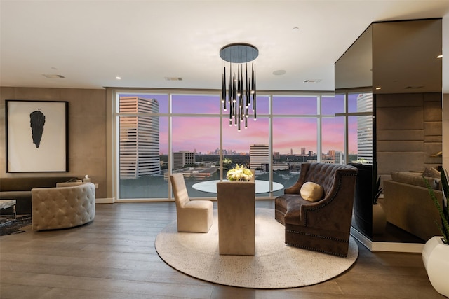 4521 San Felipe St Unit 1201, Houston, TX 77027 - dining space featuring hardwood / wood-style floors, a city view, a chandelier, and recessed lighting