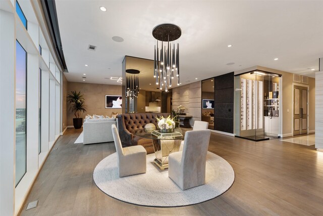 4521 San Felipe St Unit 1201, Houston, TX 77027 - dining room featuring wood finished floors and recessed lighting