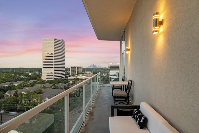 4521 San Felipe St Unit 1201, Houston, TX 77027 - balcony at dusk with a city view