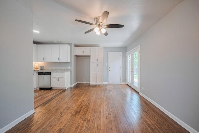 2218 Silverbonnet St, Houston, TX 77055 - kitchen featuring dishwasher, a ceiling fan, white cabinetry, and wood finished floors