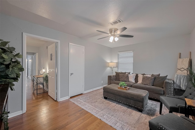 2218 Silverbonnet St, Houston, TX 77055 - living area with wood finished floors and a ceiling fan