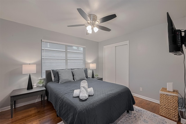 2218 Silverbonnet St, Houston, TX 77055 - bedroom with wood finished floors, a closet, and a ceiling fan
