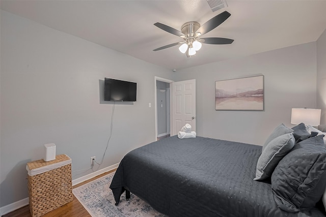 2218 Silverbonnet St, Houston, TX 77055 - bedroom featuring wood finished floors and a ceiling fan
