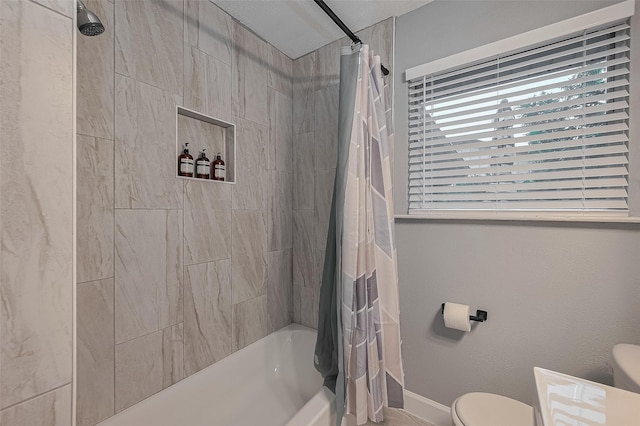 2218 Silverbonnet St, Houston, TX 77055 - full bathroom with toilet and shower / bathtub combination with curtain