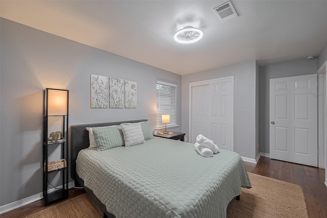 2218 Silverbonnet St, Houston, TX 77055 - bedroom with dark wood-type flooring and a closet