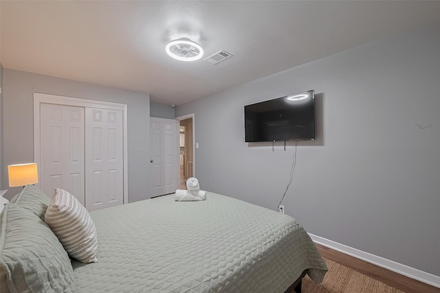 2218 Silverbonnet St, Houston, TX 77055 - bedroom with wood finished floors and a closet