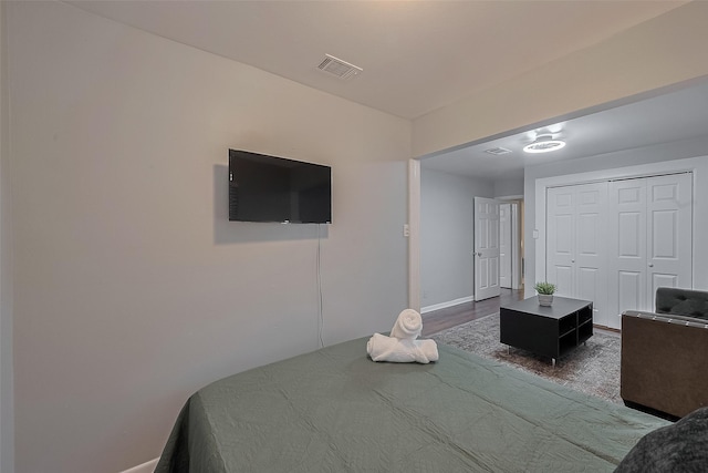 2218 Silverbonnet St, Houston, TX 77055 - bedroom featuring wood finished floors and a closet