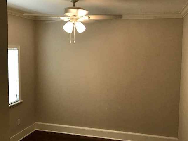 5734 Arthington St, Houston, TX 77053 - spare room with crown molding, a ceiling fan, and baseboards