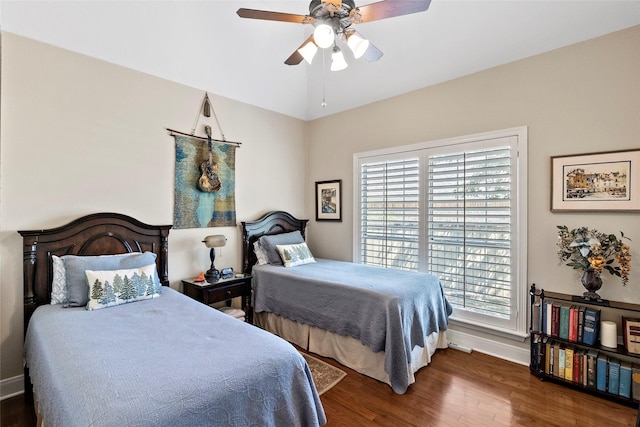 926 Grand Oaks Cir, College Station, TX 77840 - bedroom featuring wood finished floors, baseboards, and a ceiling fan