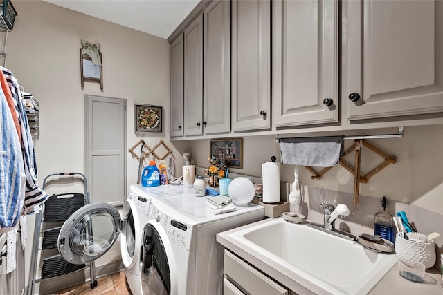 926 Grand Oaks Cir, College Station, TX 77840 - laundry area featuring separate washer and dryer and cabinet space