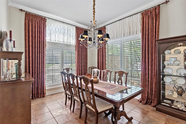 926 Grand Oaks Cir, College Station, TX 77840 - dining space with light tile patterned floors, a chandelier, plenty of natural light, and crown molding