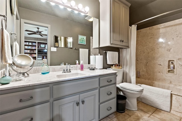 926 Grand Oaks Cir, College Station, TX 77840 - bathroom featuring vanity, tile patterned floors, ceiling fan, shower / bathtub combination with curtain, and toilet