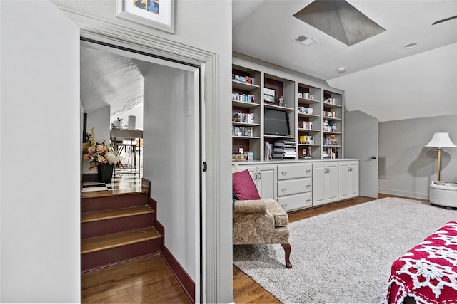 926 Grand Oaks Cir, College Station, TX 77840 - bedroom featuring wood finished floors, baseboards, and lofted ceiling