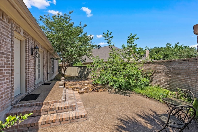 926 Grand Oaks Cir, College Station, TX 77840 - fenced backyard featuring a patio