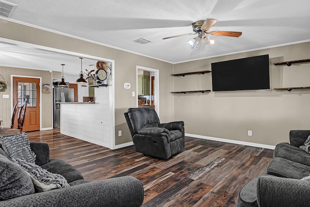 6720 Kacal Rd, Beasley, TX 77417 - living area with dark wood-style floors, ceiling fan, crown molding, and baseboards