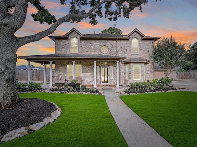 411 Golden Leaf Dr, Friendswood, TX 77546 - view of front of house with a porch and brick siding