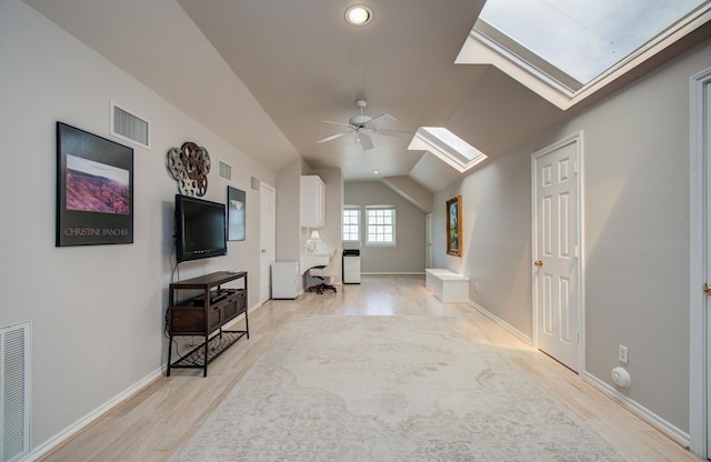 4516 Palmetto St, Bellaire, TX 77401 - bonus room with a skylight, light wood finished floors, a ceiling fan, lofted ceiling, and baseboards