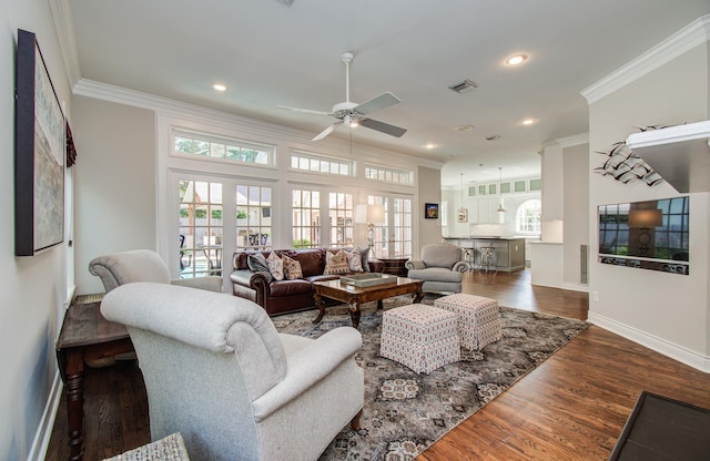 4516 Palmetto St, Bellaire, TX 77401 - living area featuring ornamental molding, a ceiling fan, baseboards, recessed lighting, and wood finished floors