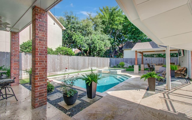 4516 Palmetto St, Bellaire, TX 77401 - view of swimming pool featuring a patio, a fenced backyard, and a pool with connected hot tub