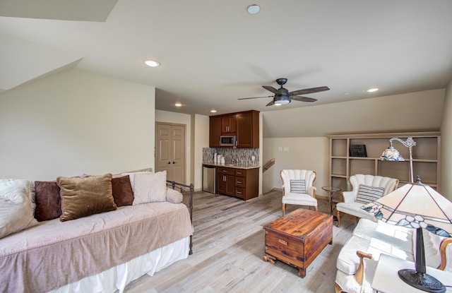4516 Palmetto St, Bellaire, TX 77401 - living area featuring a ceiling fan, light wood-style floors, and recessed lighting