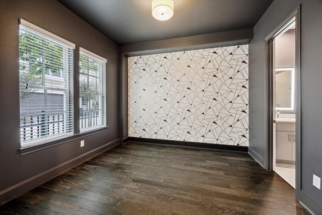 3405 Timbergrove Heights St, Houston, TX 77008 - empty room with dark wood finished floors, plenty of natural light, and baseboards
