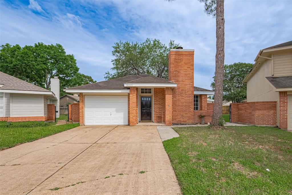 16107 Manor Point Dr, Houston, TX 77095 - view of front of house featuring a chimney, an attached garage, concrete driveway, and brick siding